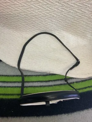 Black and white full size  kieffer leather nose band.