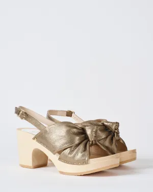 crisscross 3 inch heel clog