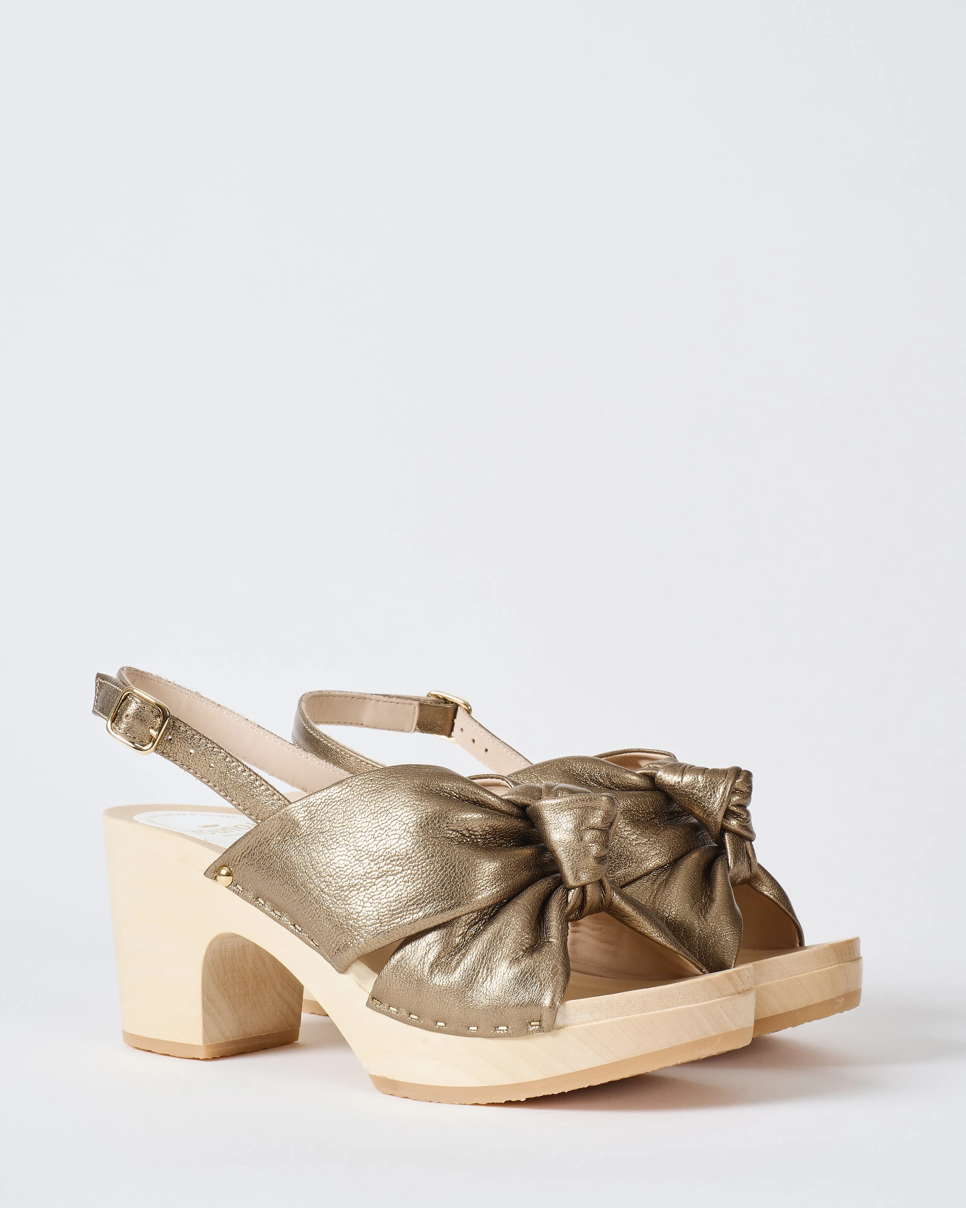 crisscross 3 inch heel clog