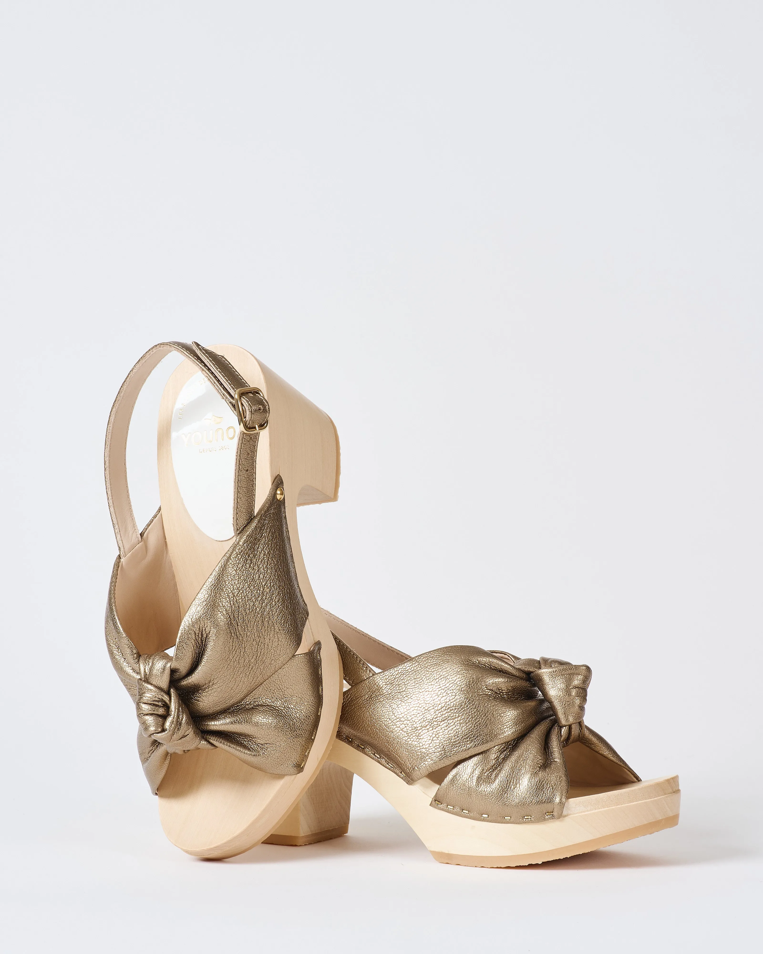 crisscross 3 inch heel clog