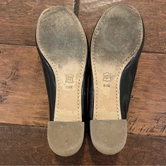 Tory Burch Black Patent Leather Shoes.