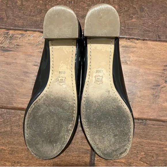 Tory Burch Black Patent Leather Shoes.
